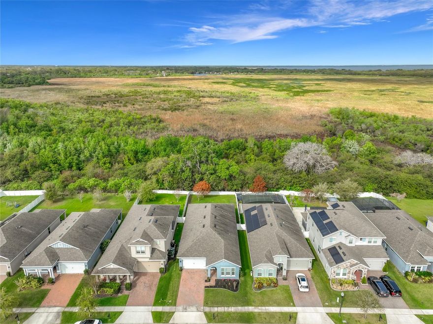 Your search for "Home" ends here in the highly coveted neighborhood of The Preserve at Turtle Creek in St. Cloud. This stunning one-story residence perfectly balances architectural sophistication with the relaxed Florida lifestyle. From the elegant driveway pavers leading to your 2-car garage to the grand interior, every detail has been curated for comfort.

The Grand Entrance

As you step inside, the home greets you with a wide grand hallway and elevated crown molding, creating an immediate sense of scale and luxury. The open-floor concept flows effortlessly into the heart of the home: an Expansive Gathering Room. This space is a showstopper, featuring two sets of triple-panel glass sliders that disappear to one panel as you merge your indoor living space with a massive screened-in lanai. The View: Enjoy ultimate privacy in your fenced-in backyard (premium vinyl fencing) overlooking a serene, lush Conservation Area—no rear neighbors to disturb your peace.

A Gourmet Destination: The kitchen is a chef’s dream, boasting: 42” Espresso cabinetry with custom crown molding and drawer pullouts.
Beautiful Granite Countertops and premium Stainless Steel Appliances. A huge Kitchen Island serving as a massive breakfast bar. A roomy walk-in pantry for ultimate organization.

Private Retreats & Versatile Spaces: 

Primary Suite: An oversized sanctuary featuring elegant crown molding and an extra-large walk-in shower and a massive walk-in closet.

Flex Space: A dedicated large Office, Den, or 4th Bedroom offers the flexibility needed for modern remote work or a growing family.Includes French Doors with Glass Panels.

Community & Beyond: Living here means access to resort-style amenities including a Community Pool, Clubhouse, Playground, and Dog Park.

The Location:
Nature lovers will thrive with nearby Lake Tohopekaliga for world-class fishing, boating, and swimming. For the urban explorer, the home offers "ease of access" to Lake Nona events, Medical City, Championship Golf Courses, Beaches, and Amusement Parks. With Narcoossee Rd, the 417, and the Florida Turnpike just minutes away, all of Central Florida is within reach.

Home includes Private Mailbox and Water Softener.

Schedule your private tour today to experience this rare combination of luxury, location, and tranquility!