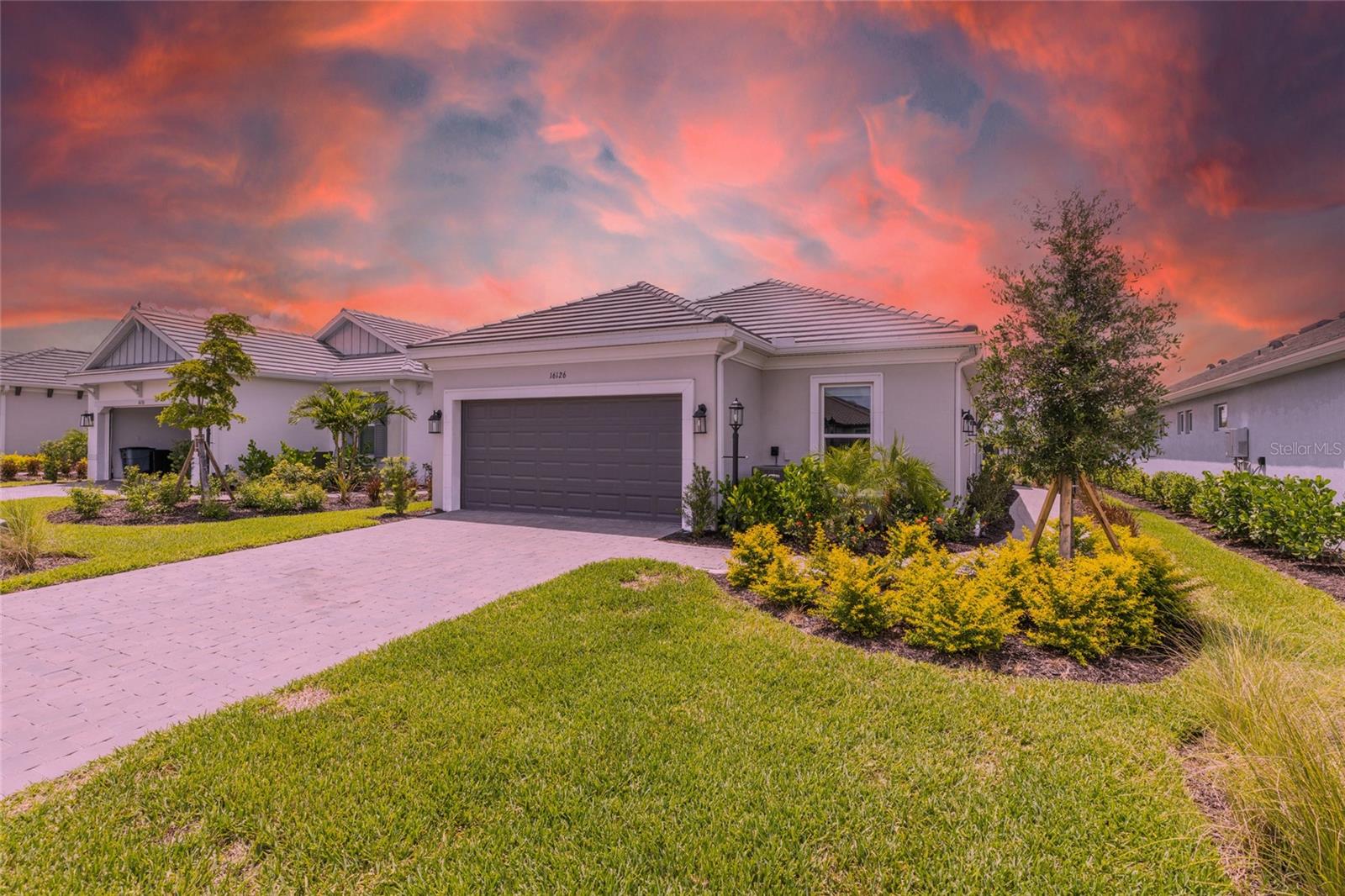 Major Price Reduction – Don’t Miss This Rare Opportunity!
Enjoy breathtaking water views and a premium golf-deeded lot without waiting for new construction! Welcome to resort-style living in the prestigious, gated community of Esplanade at Azario. This immaculate 3-bedroom, 2-bath Arrezo model offers 1,926 sq. ft. of thoughtfully designed, maintenance-free living—where every day feels like a vacation.
Built in 2024, this pond-facing home features a flat tile roof and is covered under a transferable builder warranty through October 2025. The home is pre-plumbed for a pool, making it easy to create your dream outdoor oasis—perfect for those serene Florida sunsets.
Step inside to a bright, open layout enhanced by tray ceilings in the primary suite, living room, and flex space, along with crown molding throughout. The gourmet kitchen showcases shaker cabinets, quartz countertops, a gas range, subway tile backsplash, and stainless steel appliances. Included are an LG refrigerator and Samsung Bespoke washer and dryer for added convenience.
The primary suite is a true retreat, offering a spacious walk-in closet, dual vanities, an oversized shower, and a private water closet. The two additional bedrooms and flex room are positioned for optimal privacy—ideal for guests or a home office.
Located just minutes from world-class beaches, shopping, dining, and entertainment, this home offers more than a place to live—it delivers the Florida lifestyle you've been dreaming of.
Schedule your showing today—and start living like you're on vacation tomorrow!