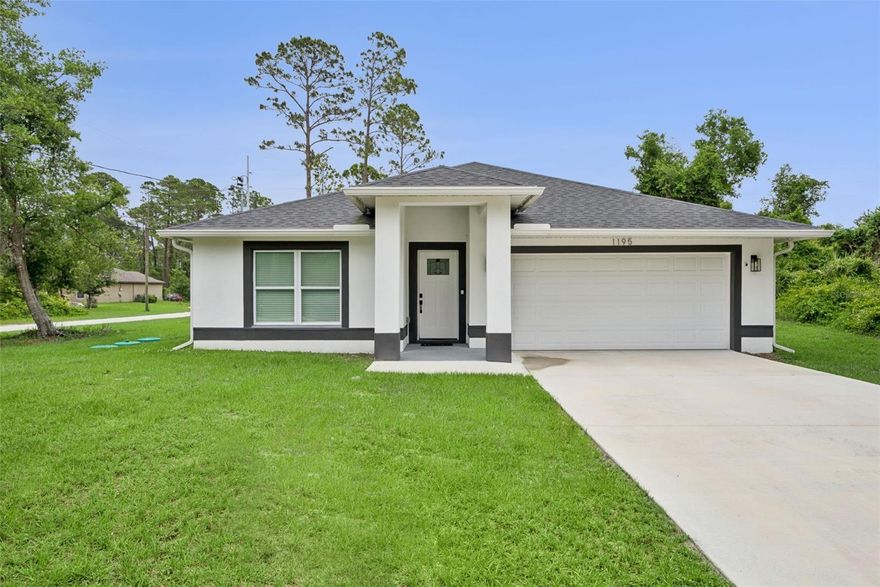 Experience elevated one-floor living in this beautifully maintained DeLand home, thoughtfully designed with elegance, comfort, and functionality in mind. Buyers searching for a move-in ready property with upscale finishes and an open-concept layout will appreciate the attention to detail found throughout this stunning residence. This DeLand home offers modern sophistication in a warm and inviting atmosphere.
Inside, the bright open floor plan is enhanced by high ceilings, recessed lighting, and beautiful porcelain tile flooring that flows seamlessly throughout the entire home. The gourmet kitchen serves as the centerpiece of the living space and features 42-inch Nice Shaker cabinetry with soft-close hinges, striking quartz countertops, stainless steel appliances, and an oversized extended island with sink and ample seating, perfect for entertaining or casual gatherings.
The spacious owner's retreat provides a relaxing escape with recessed lighting, an oversized bedroom layout, and a sizable walk-in closet. The luxurious primary bathroom showcases double vanities, quartz countertops, premium cabinetry, and impressive floor-to-ceiling tile detailing that creates a spa-inspired feel. Secondary bathrooms continue the upscale design with stylish finishes and quality craftsmanship throughout. Built with both style and practicality in mind, this home blends contemporary design with comfortable Florida living. Every detail has been carefully selected to create a polished and welcoming environment that feels both modern and timeless.