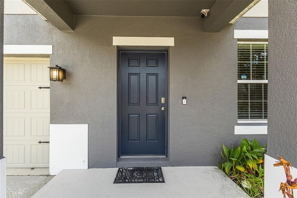 Photo of 1961 Nations Way, Saint Cloud, FL 34769 (MLS # O6333042)