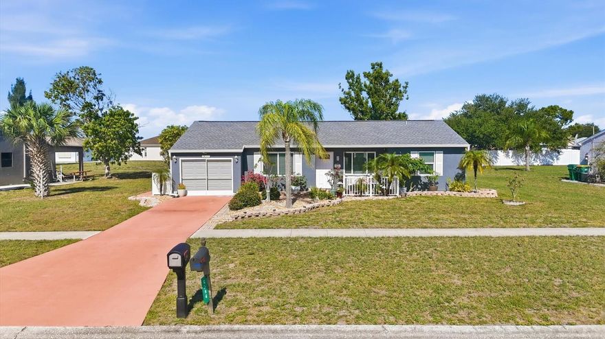 This is a well maintained, original owner 3 bedroom 2 bath house in the very nice established 360 acre community of Gardens of Gulf Cove. You will note the loving care from the moment you stop in the driveway.  The porch features many florida plants and a place to sit and have your morning coffee while listening to the birds.  The house has all hurricane impact doors and windows, Roof 2022, AC 2021, newer HWH, updated bathrooms, screened garage door, all floors are wood laminate, newer appliances just to mention a few of the upgrades.  Gardens of Gulf Cove is a deed restricted community, with public water & sewer and offers many amenities including  2 community pools, tennis/pickle ball courts, fitness center, recreation center, sidewalks, lighting  and underground utilities with a low yearly HOA fee of $470.  The location is ideal as you are close to grocery, minutes to the beach and restaurants.