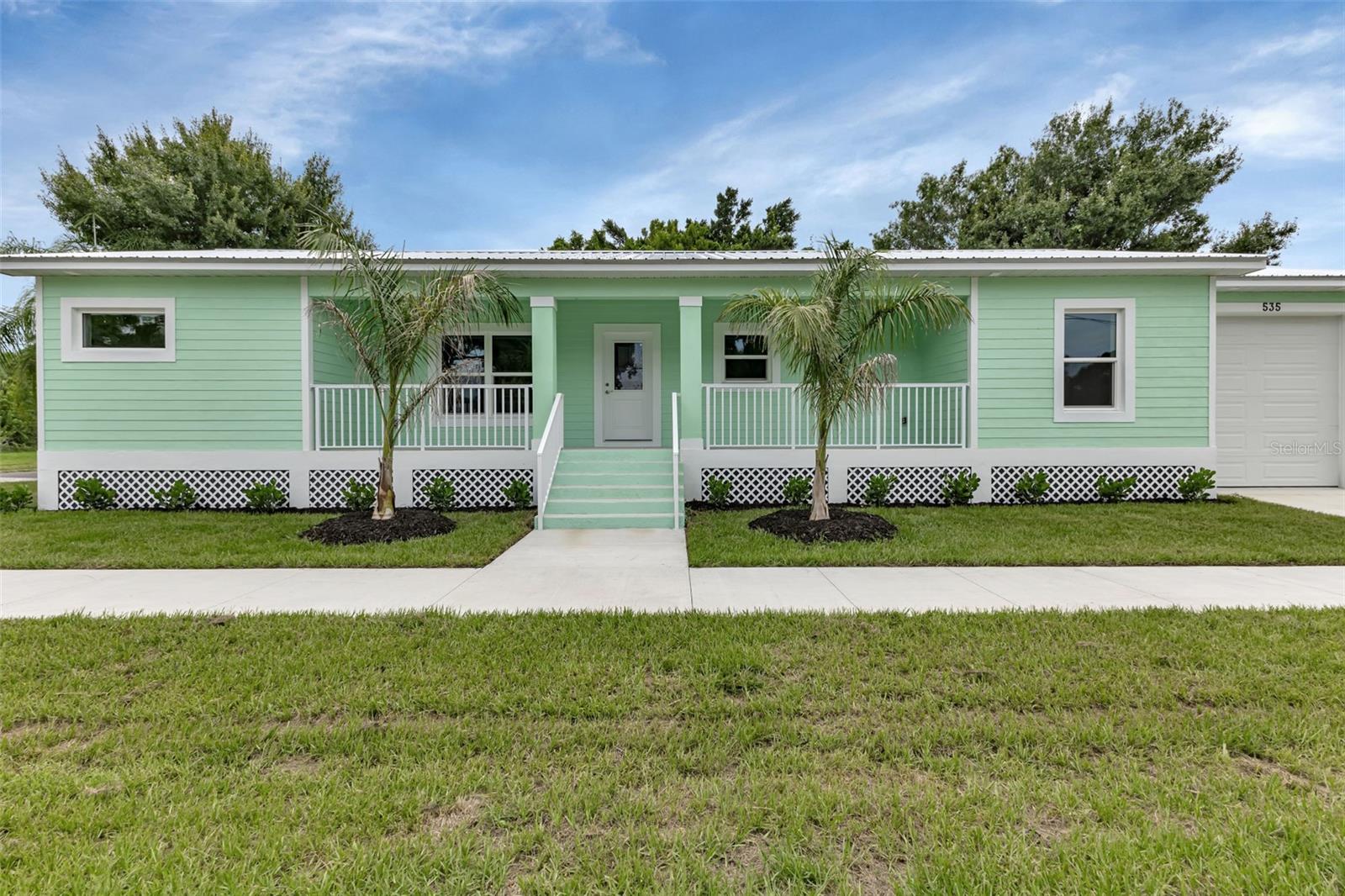 Brand new 2 bedroom, 2 bath, 1 car garage BLOCK home sitting on a 5 course stem wall located near downtown Punta Gorda. Walking distance to Laishley Park and downtown, where you'll find plenty of dining, shopping and entertainment. Featuring LVP flooring throughout, carpet in bedrooms, granite counters, wood cabinets, metal roof, impact windows, washer and dryer, and a huge front porch. CITY WATER and SEWER. NO HOA. Right down the street you'll find the South County Sports Complex including basketball courts, baseball fields, soccer, tennis, pickleball, swimming, remote control cars and boat racing and playgrounds. You will love this fishing and boating community. Come and take a look today!
