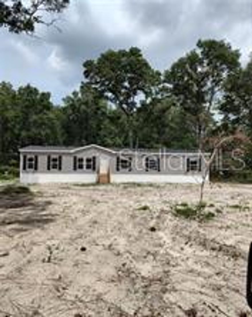 OWNER FINANCING AVAILABLE for this great Archer Florida location. 2023, 5 Bedroom, 3 bathroom, Appx 1898 Sq. Ft. of H/A on One Acre Lot on Archer Road, Archer FL. This 1-acre property is located in a fast-growing area with access to Shopping, Banking, and UF Health Pediatrics Facility at the Tower Square Shopping Center. Close proximity to Elementary, Middle, and High Schools and only minutes away from The Oaks Mall, Haile Plantation, Kanapaha Botanical Gardens, and Tower Road. A zoning change to commercial and the great exposure to Archer Road is a plus for a new owner looking to locate a thriving business! Don't miss out on this opportunity to grow in a thriving area within minutes of Gainesville and the University OF  Florida