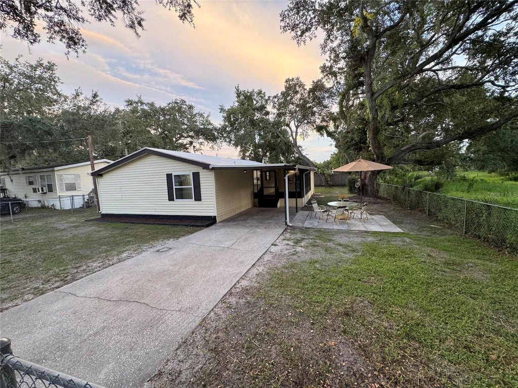 Photo of 8801 Marc David Ln, Gibsonton, FL 33534 (MLS # O6435910)