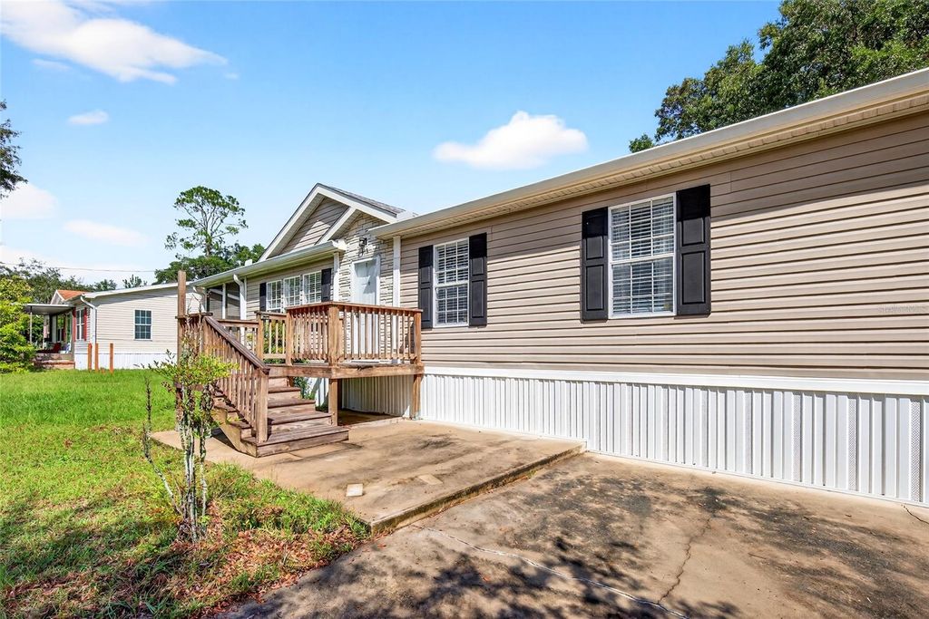 Photo of 413 Quail Street, Lady Lake, FL 32159 (MLS # OM711414)