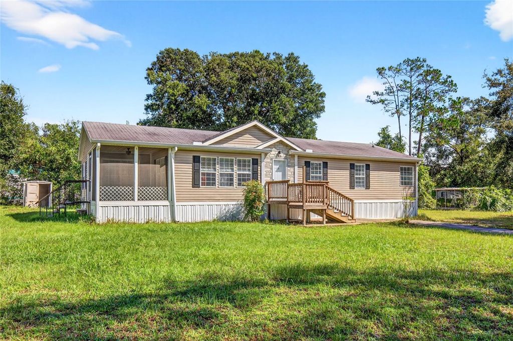 Photo of 413 Quail Street, Lady Lake, FL 32159 (MLS # OM711414)