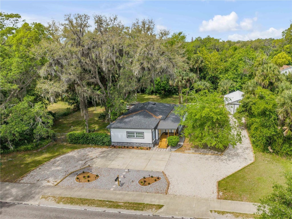 Photo of 1956 Pioneer Trail, New Smyrna Beach, FL 32168 (MLS # TB8543942)