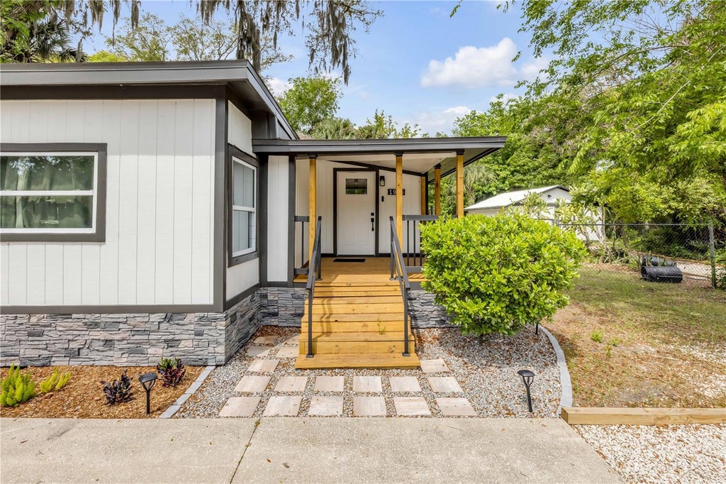 Photo of 1956 Pioneer Trail, New Smyrna Beach, FL 32168 (MLS # TB8543942)