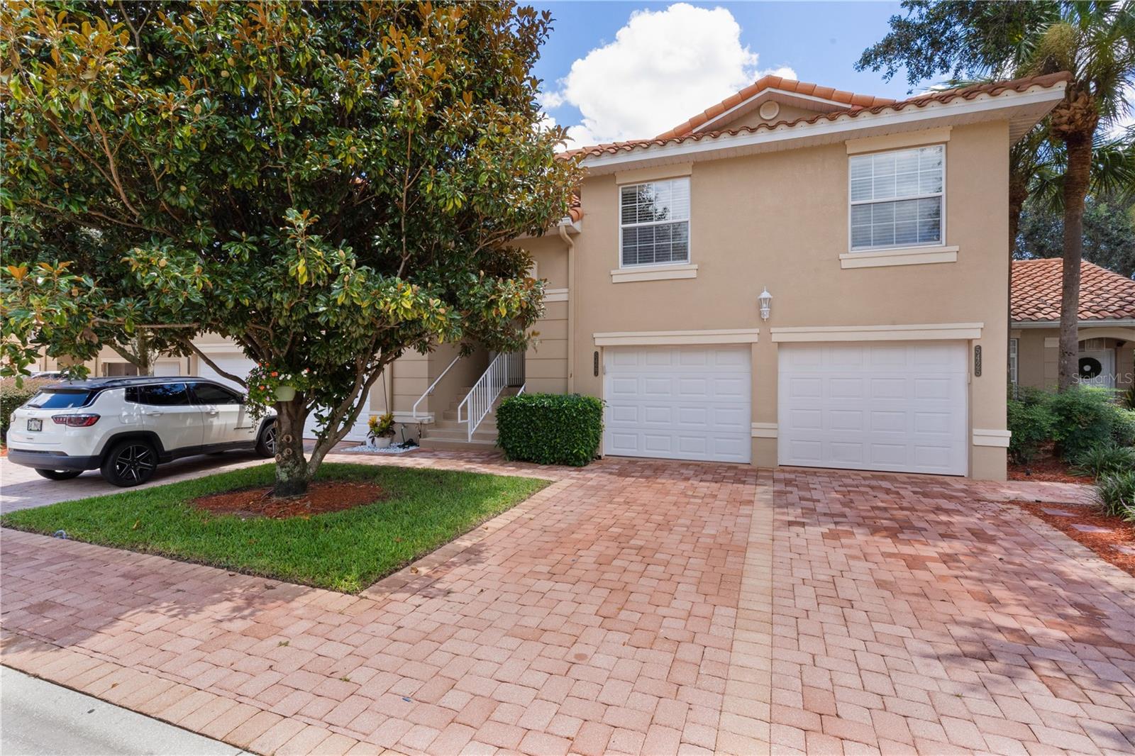 Welcome to Lakeside Landing – A Premier Gated Community Near The Villages. Discover the perfect blend of comfort, privacy, and resort-style living in this beautifully maintained 2-bedroom, 2-bath second-floor Condo, nestled in the highly sought-after, family-friendly community of Lakeside Landing—just minutes from The Villages.
This light and airy second-floor unit offers a private retreat with soaring vaulted ceilings and an open-concept floor plan that seamlessly connects the kitchen, dining, and spacious living area. The upgraded GE Profile kitchen appliances, abundant cabinetry, and adjacent office/laundry room (washer/dryer included) add practicality and convenience.
The primary bedroom features vaulted ceilings, an upgraded ceiling fan, and a luxurious en-suite bath with dual vanities, a tiled walk-in shower, and a walk-in closet with custom shelving. A double sliding glass door leads to your screened-in patio, ideal for morning coffee or sunset relaxation.
Additional highlights include:
Stucco exterior and durable tile roof
Paver driveway and sidewalks
Oversized 1-car garage with a large storage closet
Brand-new Carrier A/C unit and hi-tech LiftMaster silent garage door (2024)
HOA-covered exterior maintenance, landscaping, lawn care, and pest control—stress-free living year-round!
Lakeside Landing offers gated security and resort-style amenities, including:
A stunning clubhouse with ballroom and billiards room
Two resort-style pools
Fitness center, daily exercise classes & community events
Tennis and pickleball courts, basketball court, playground, and dog park
Access to Lake Miona, a beautiful ski lake with great fishing
Golf cart access to The Villages, shopping, dining, and nightly live entertainment
Whether you're looking for a full-time residence, winter retreat, or a low-maintenance investment, this condo delivers on lifestyle, location, and value.