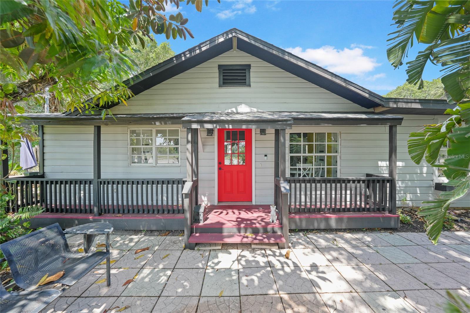 Step into this beautifully rebuilt single-story 1950s courtyard-style farmhouse, where classic charm meets modern comfort. Thoughtfully designed around a central pool, the layout of the home features two bedrooms and two baths along with a separate third bedroom in a private 550 sqft apartment —complete with its own entrance, perfect for guests, extended family, or a home office. Set on a half-acre, the property offers a resort-style backyard with lush landscaping, two covered lanais for shaded outdoor living, and a sparkling pool at the heart of it all—ideal for relaxing or entertaining in total privacy. A 5,000 sqft custom shop provides unmatched flexibility for automotive projects, a home business, carpentry, and more. It includes three lifts, a full kitchenette, and a full bath. An additional 700 sqft under roof, including a greenhouse, extends off the shop—offering even more room for hobbies, storage, or creative pursuits. A rare blend of comfort, functionality, and versatility—this property is truly one of a kind. (MULTIPLE FINANCING OPTIONS AVAILABLE)