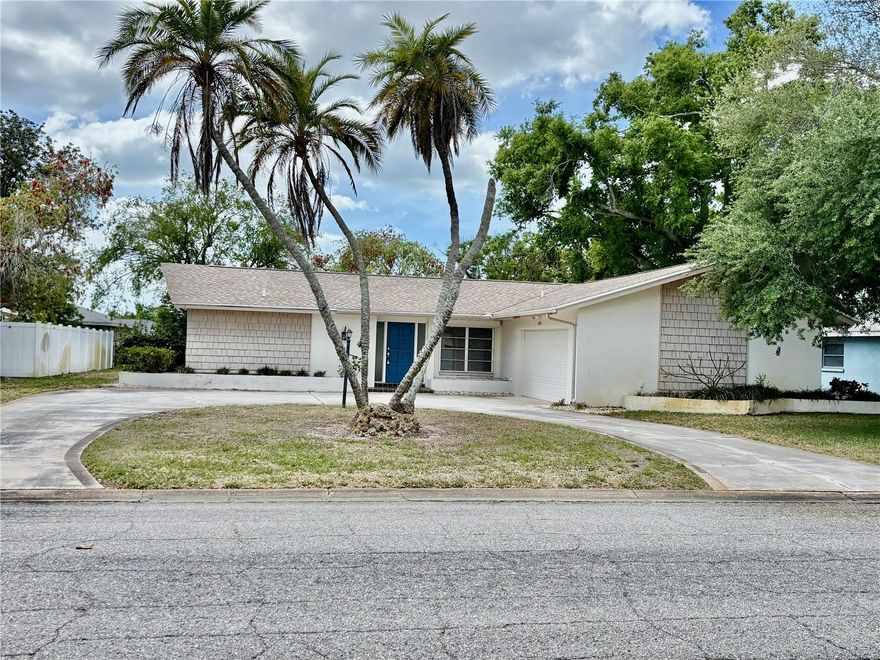 This 2 bedroom 2 bath home with oversized 2 garage is a an authentic Arthur Rutenberg  home that has the highly valued  historical limited edition markers “Signature” bronze plaque located at Front door. These Plaques denote a custom built home that met their specific architectural high standards in mid century. This light & bright home has a circular driveway, in an extremely quiet neighborhood -NEW ROOF 2 years - WATER HEATER 3 years- HURRICANE SHUTTERS- Stainless appliances, Subway tile in kitchen with
 Corian counters - Granite Counters in both bathrooms- Huge  Enclosed Lanai - has a Family Room plus Living Room with dining area and walk in closet in master bedroom.  This home needs some cosmetic refresh but is in one of the most desirable neighborhoods in WEST BRADENTON due to its proximity to hospital, shopping, restaurants and only 10 minutes to the famous beaches on Anna Maria Island!  Also located near public boat ramps, Robinson Preserve and Desoto Park.  This home is perfect as a PRIMARY residence, SEASONAL retreat or Investment Opportunity-  Don’t miss a chance to own this exceptional home and start enjoying Florida Living at its very best.