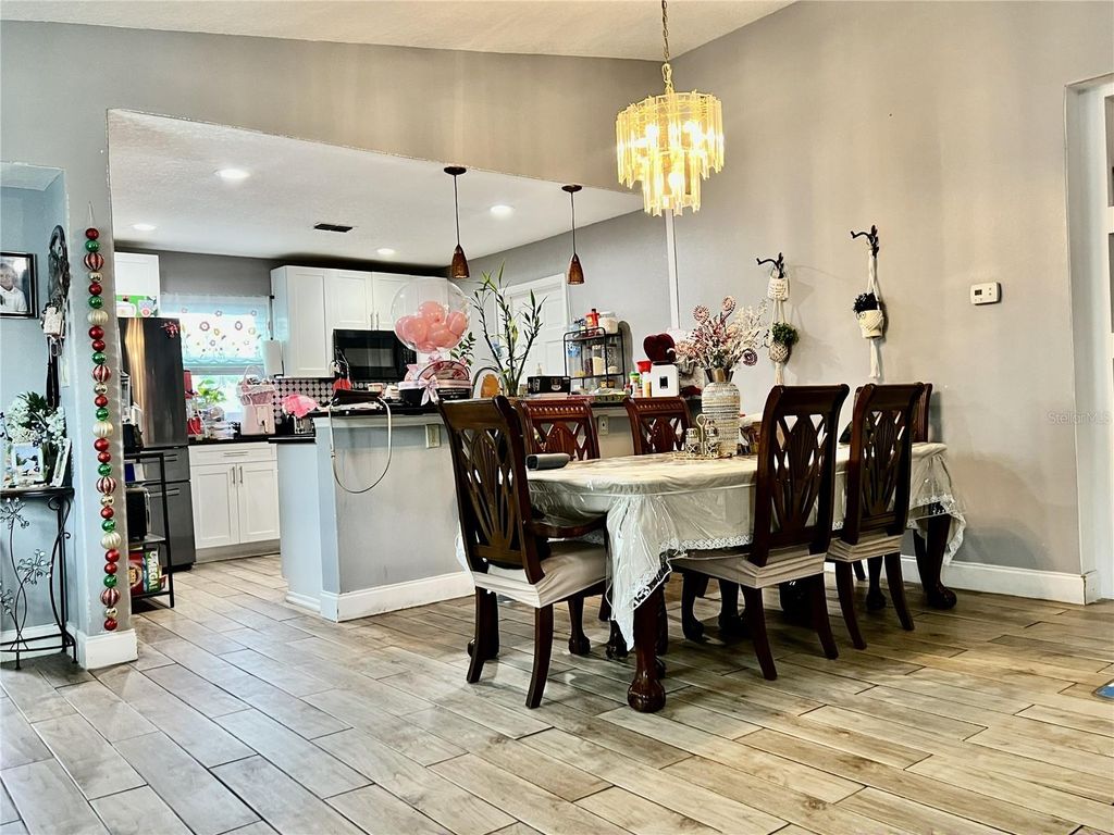 Photo of 10804 N Myrtle Street, Tampa, FL 33617 (MLS # TB8490732)