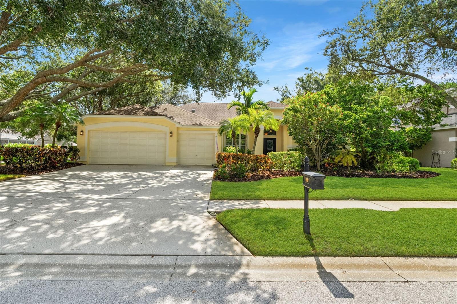 Welcome to your private oasis in the coveted Highgate at Lansbrook. This spacious corner-lot home on a cul-de-sac offers the perfect blend of comfort, functionality, and Florida lifestyle in one of Palm Harbor’s most desirable neighborhoods. With over 3,400 sqft of living space, this unique 3-WAY SPLIT FLOOR PLAN includes a formal living area, dining room (being used as game room), and a bright, open-concept family room. The chef’s kitchen features GRANITE countertops, WOOD cabinetry, stainless steel appliances, DOUBLE OVENS, spacious WALK-IN PANTRY, prep island with sink, and a OVERSIZED breakfast bar that flows into the breakfast room and family room.
The private owner's suite offers direct access to the screened lanai and pool, along with DUAL CUSTOM WALK-IN CLOSETS and a spa-like bath with SOAKING tub, glass shower, and DOUBLE vanities. Outdoor living shines with a screened-in PRIVATE SALTWATER pool and raised HEATED spa, and spacious lanai for shaded dining and entertaining. The low-maintenance fenced yard includes artificial turf—perfect for pets or play.
Recent updates include pool equipment (2–4 years old), saltwater system and heater, newer appliances, flooring, and an owned water softener. Highgate at Lansbrook offers private lake access with a boat ramp to Lake Tarpon, fishing pier, scenic boardwalks, sports fields, basketball courts, playgrounds, and shaded picnic areas. The community is known for tree-lined streets, top-rated schools, and active lifestyle amenities with a low annual HOA fee and no CDD. Don’t miss this opportunity to own a well-maintained home in one of Pinellas County’s most sought-after neighborhoods.