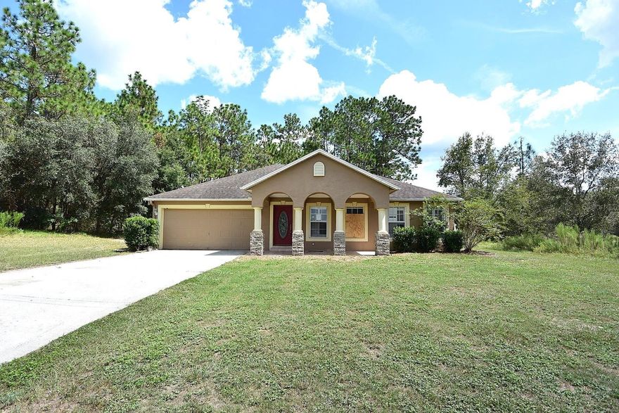 One or more photo(s) has been virtually staged. This spacious 4-bedroom, 2-bathroom home offers a fantastic opportunity for those looking to add their personal touch. Featuring a split floor plan, the layout includes a formal living room and a kitchen that opens to a family room with a designated dining area—perfect for everyday living and entertaining. The fourth bedroom offers flexibility and could easily be used as a home office. Enjoy outdoor living with both front and rear porches, a fully fenced backyard with a separate dog run, a detached utility shed for extra storage, and a generous side yard with ample room for boat or RV parking. The 2-car garage adds convenience, while the overall layout provides comfort and functionality. The home does need some TLC, so cash or rehab financing is recommended due to its current condition. With a little imagination and effort, this could be a great opportunity to transform this property into your ideal home!