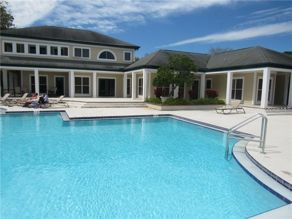 Beautiful 2 Bedroom/2 Bath in the heart of Carrollwood on the top floor of the Luxury Condo Community - THE LANDINGS OF TAMPA! This condo has a BIRD'S EYE WATER VIEW from its SCREENED-IN BALCONY. Bathrooms have been UPGRADED! Master Bath has an oversized Bath/Tub combo with a double-headed shower. Guest bath also features a double-headed shower. Both Bedrooms have WALK-IN CLOSETS! Floors have been UPGRADED! STAINLESS STEEL appliances in the kitchen. CEILING FANS in both bedrooms and the Family Room. The balcony has new beautiful tile flooring and an OUTDOOR STORAGE CLOSET. The Gated Community features a 24-hour Fitness Center, Pool, Jacuzzi, Lighted Tennis Court, Volleyball Court, Playground, BBQ area, Car Wash area, Pet stations