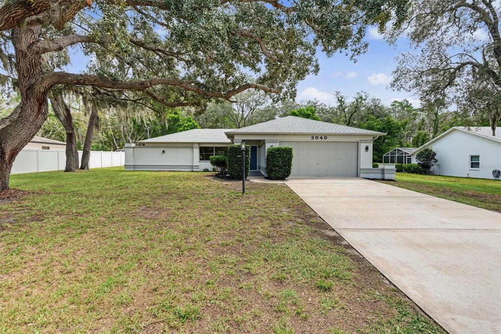 Photo of 3040 Bayshore Drive, Spring Hill, FL 34608 (MLS # TB8538931)