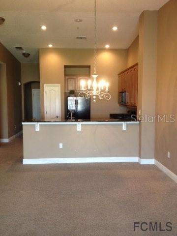 top floor condo with vaulted ceilings and great view overlooking the lake to the Intracoastal Waterway