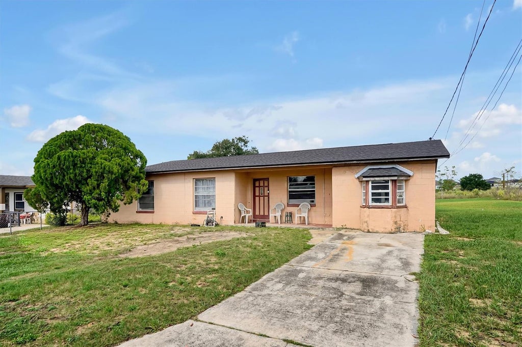Photo of 820 Booker Street, Haines City, FL 33844 (MLS # S5159662)