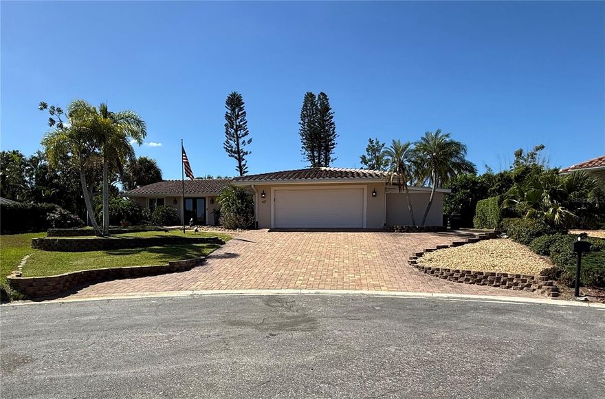 Nestled on a quiet cul-de-sac in one of Nokomis’ most desirable BOATING communities, this coastal retreat combines modern updates, comfort, and true Florida living. Set on a generous 1/3 acre interior lot, this three-bedroom, two-bath pool home includes a DEEDED BOAT DOCK with a 10,000-lb LIFT and direct Intracoastal access—ideal for boating, kayaking, or fishing and just minutes to the Gulf . Inside, the open layout features a spacious great room and vaulted dining area overlooking the screened lanai and sparkling pool, perfect for relaxing or entertaining. The kitchen offers stainless steel appliances, granite countertops, wood cabinetry, and a breakfast nook with pool views. The spacious primary suite has private access to the lanai, a reading nook, ensuite bathroom with dual sinks, a walk-in shower, and ample closet space, while the guest bath includes a large linen closet, bathtub/shower combo.

This home has been thoughtfully maintained and updated throughout, including a NEW ROOF 2024 , IMPACT RESISTANT WINDOWS , RE-PLUMBED and REWIRED systems, a Rainbird six-zone well-fed IRRIGATION system, WATER FILTRATION, RESURFACED POOL 2014 , and a NEW POOL HEATER in 2022. Additional highlights include an oversized paver driveway, two-car garage, a storage shed or golf cart garage, and a recently serviced septic system (2025). The private backyard is lush and serene, with tropical landscaping, a MATURE MANGO TREE , and a charming water feature out front. A dog-friendly design with a doggie door offers easy access to the fenced yard.

Located in the high and dry X flood zone, this property delivers peace of mind and effortless coastal living. It’s just a golf cart ride to Nokomis Beach and close to Historic Downtown Venice, Casey Key, Siesta Key, the Legacy Trail, Pine View School for the Gifted, and Sarasota’s vibrant dining and cultural scene. This hidden gem offers the perfect blend of location, lifestyle, and lasting value—Florida coastal living at its best.