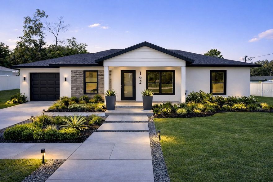 Photos may include virtual staging. Homes may feature design variations and multiple interior finish and exterior landscaping packages to select from. We offer both completed homes and homes to be built. For to be built inventory, buyers may select finishes after an executed purchase agreement and deposit. Brand New Construction | Ocala | No HOA 
Open concept layout is anchored by a well composed kitchen featuring modern cabinetry, quartz countertops, stainless steel appliances, and a generous island with seating. Luxury vinyl plank flooring and a calm neutral palette create a seamless flow throughout. The primary bath delivers a spa caliber experience with full height shower tile, penny tile mosaic flooring for refined texture and secure footing, and a dual his and hers vanity finished in a modern style with designer lighting and refined hardware. The overall aesthetic is sophisticated, high contrast, and boutique hotel inspired. Availability varies by home and availability, allowing clients to choose from elevated palettes and finishes. Attached GARAGE and with NO HOA, enjoy the freedom to personalize your property as you wish. Located about 3 minutes to downtown dining and entertainment, and approximately 20 minutes to the World Equestrian Center, ideal for a primary residence or Airbnb.