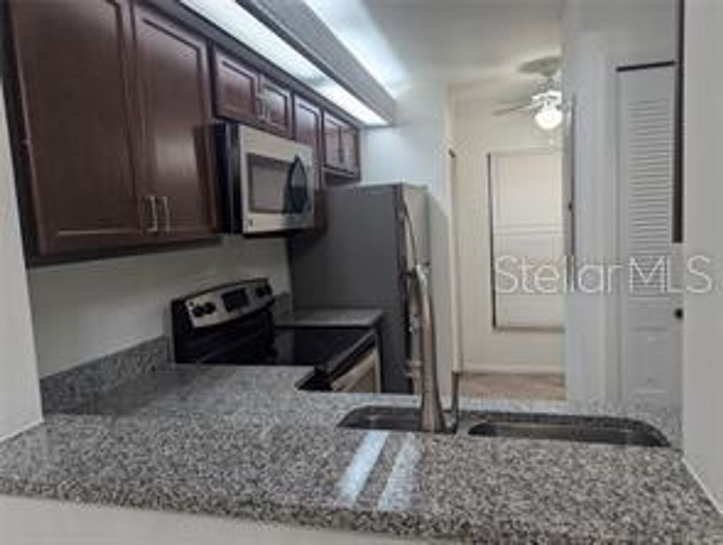 Photo of 2912 S Semoran Boulevard #C9, Orlando, FL 32822 (MLS # O6396444)