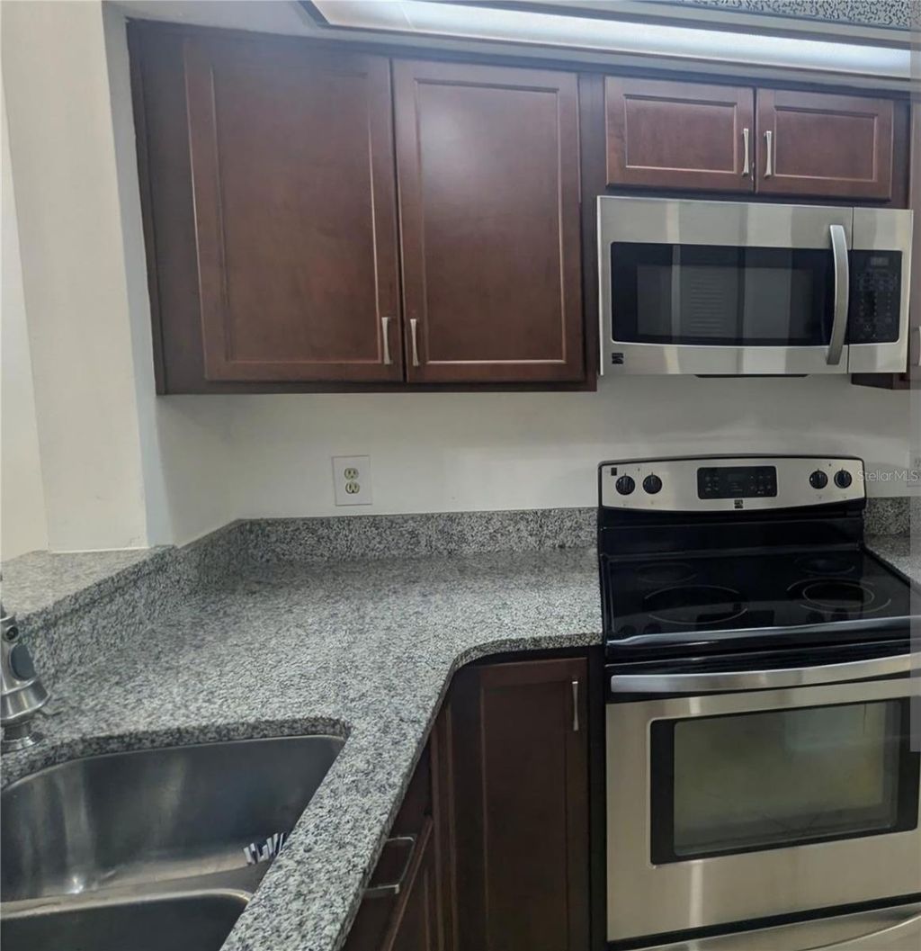 Photo of 2912 S Semoran Boulevard #C9, Orlando, FL 32822 (MLS # O6396444)