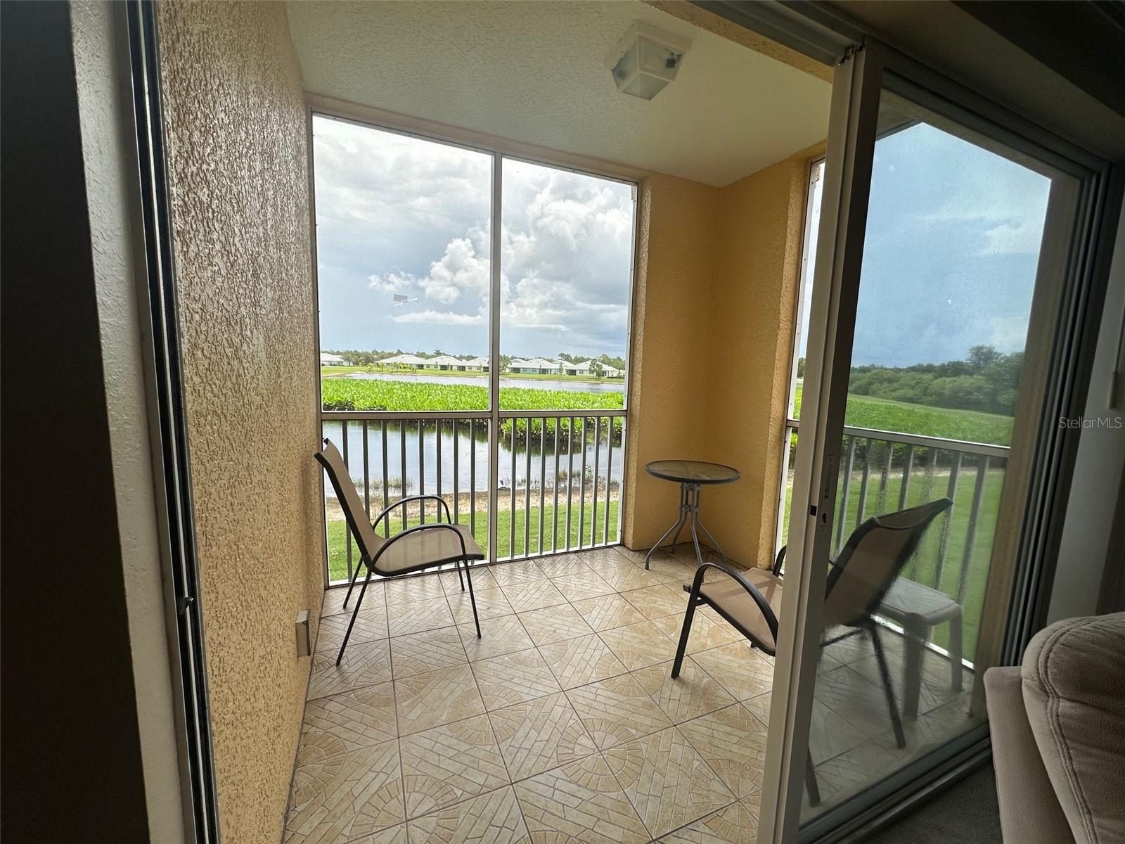 Welcome to this bright and airy 2 Bedroom, 2 Bathroom condo located in the gated, prestigious community of Heritage Lake Park. Built in 2006, this second floor CORNER condo unit offers nearly a 1000 square feet of TURNKEY living space. The home has only been used as a seasonal residence by the current owners, making it a perfect place to call home! Washer/dryer combo stays too. Kitchen has a french door refrigerator and tile flooring. Step out onto the oversized tiled lanai which offers screening on two sides and breath-taking views of the lush landscape and serene water features-ideal for relaxing or entertaining guests. The condo has a deeded parking space and ample guest parking. The residents enjoy an array of amenities including a Clubhouse, Heated Community Pool, Pickleball and Tennis courts, and a fully equipped Fitness Center. Come see your perfect lifestyle at Heritage Lake Park.