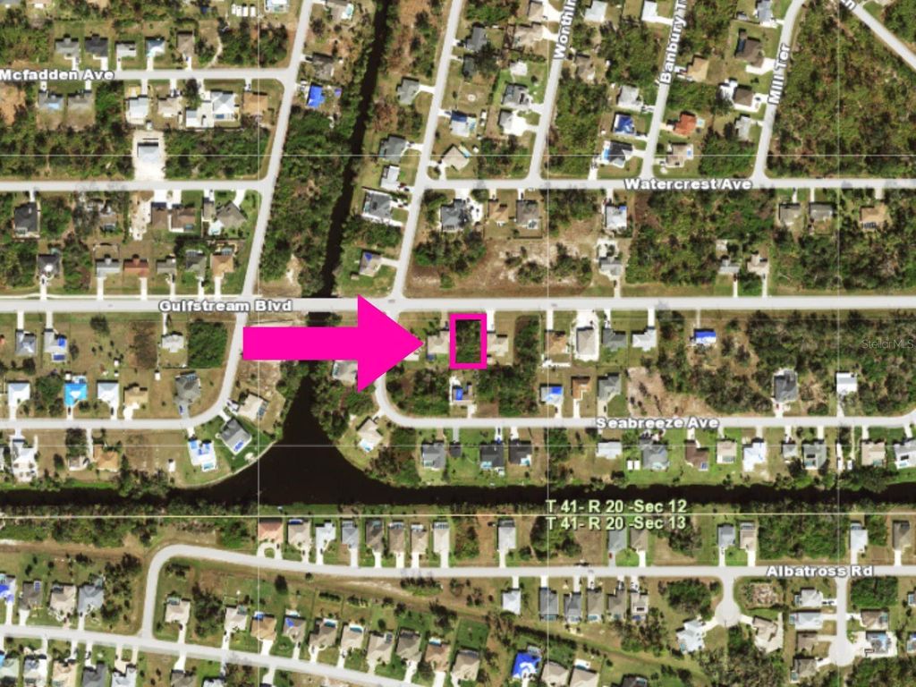 Photo of 11181 Gulfstream Boulevard, Port Charlotte, FL 33981 (MLS # C7515512)