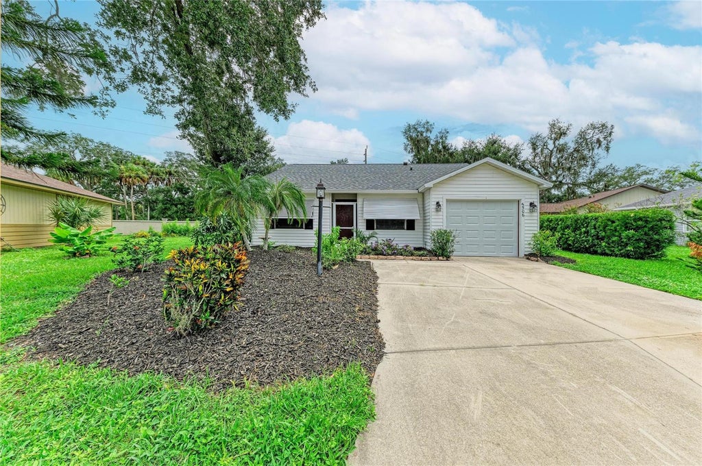 Photo of 5506 82nd Avenue Drive E, Palmetto, FL 34221 (MLS # A4702272)