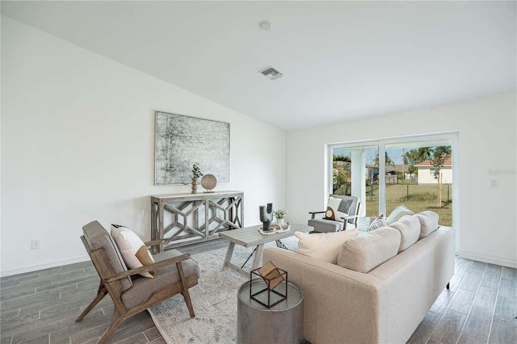 Photo of 1019 Tropical Avenue NW, Port Charlotte, FL 33948 (MLS # A4700046)