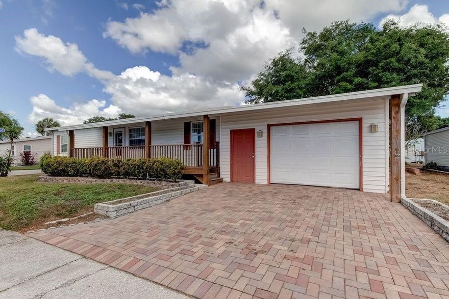 Don't miss this desirable and very active community of Gull-Aire Village! This is one of the most highly sought-after 55+ communities in Pinellas County. With HOA fees at only $60/mo and the ability to rent out your home after only 1 year of ownership, the possibilities are endless. This home includes a rare LARGE GARAGE! You own your own land. The owner has just replaced the range and refrigerator! One pet-any size. You can walk to AMC Theatres, Beall's, Marshalls, Earth Fare, Pet Smart and Dollar Store. Restaurants nearby include Shaker and Peel, Craft Street Kitchen, and Eve's Family Restaurant. Just minutes to Westfield Mall, Walmart, Publix, and Countryside Hospital. About 20 minutes to the beautiful beaches of Honeymoon Island and Caladesi State Parks. Schedule your private showing today!