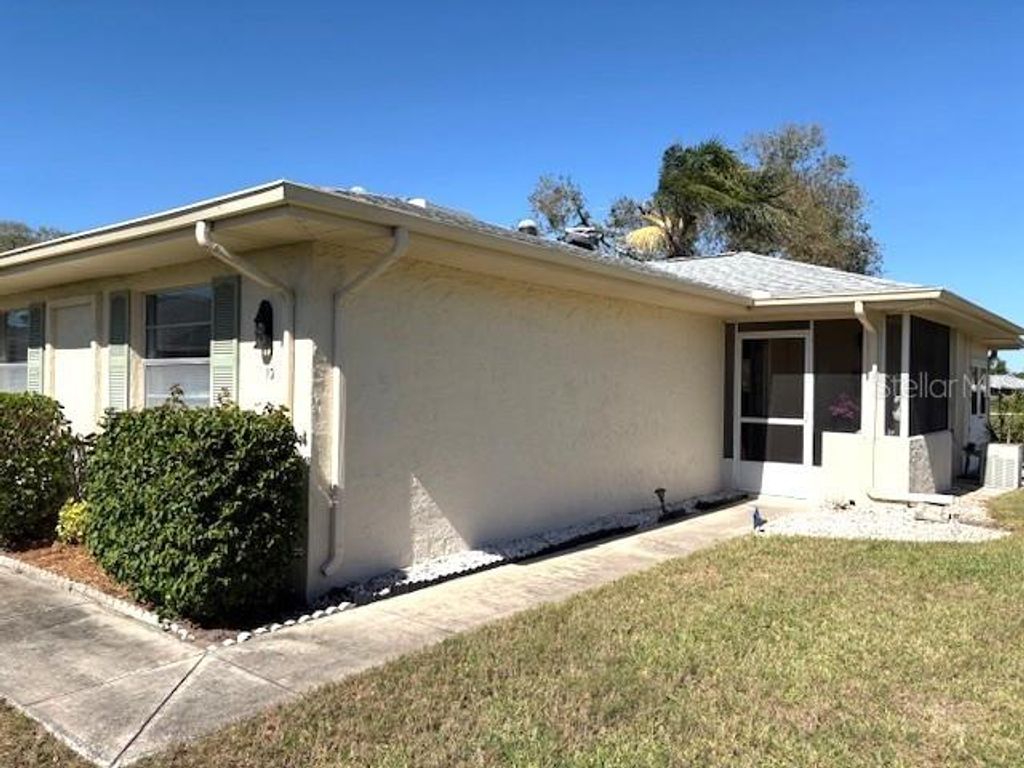 Photo of 1901 Canterbury Lane #10, Sun City Center, FL 33573 (MLS # TB8439966)