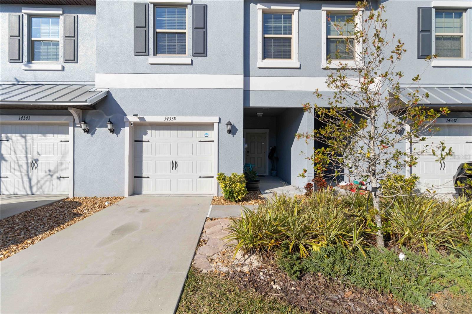 This almost new home is perfect for first time buyers, single persona, families, or anyone seeking maintenance free living! Inquire about first time home owner loans. Motivated Seller, all reasonable offers considered. Location and amenities with low HOA's, are key features with this property. Enjoy the convenience of your garage, with upgraded washable flooring. The dining living combo has beautifully upgraded lighting and the great room concept makes it perfect for entertaining. Enjoy cooking with the new stainless appliances and a nice sized pantry. Upstairs you will find a large loft, a beautiful spacious main bedroom with a ensuite, the ensuite has dual sinks plus a lovely walk-in closet. There are two more large bedrooms upstairs, so there is plenty of room for the out of town guest or for a larger family. This home has a screened in lanai for you to relax and enjoy some out door space and even fire up the grill. The resort style amenities include a beach pool, clubhouse, sports center, and scenic walking trails. This location is conveniently located steps away from a new Publix, Sun Coast Credit Union, and many shopping areas for your pleasure. Your commute is a short distance to Tampa, Apollo Beach, St. Pete and only a quick 30 plus minutes drive to the University Town Center with fabulous dining.