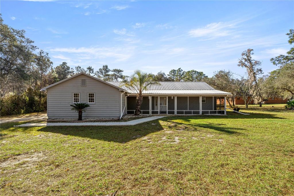 Photo of 11921 SE 169th Avenue Road, Ocklawaha, FL 32179 (MLS # OM715583)