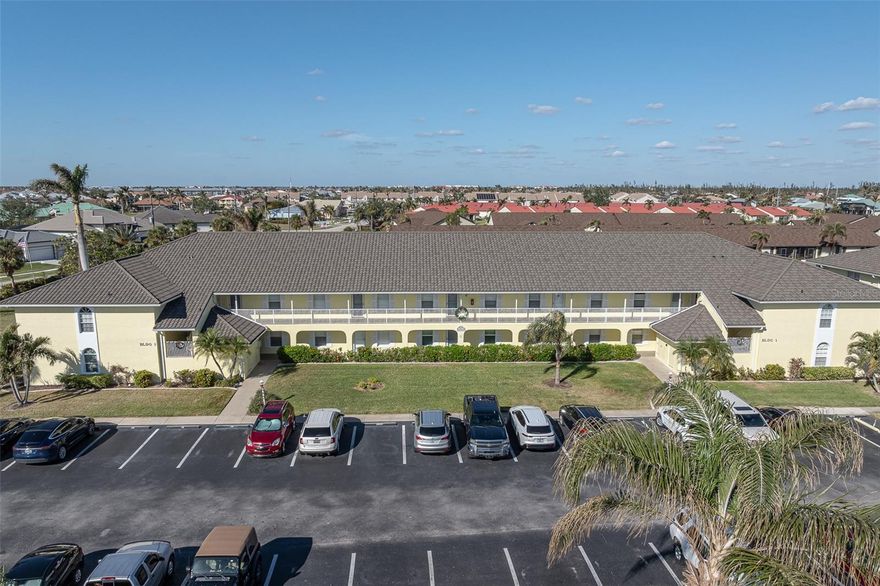 TURNKEY SPINNAKER POINT CONDO IN PGI W/SAILBOAT ACCESS - Live the waterfront lifestyle in this spacious, 2 bed/2 bath, top-floor condo in Punta Gorda Isles offering sailboat access to Charlotte Harbor, beautiful canal views, and dock space (available on a first come, first serve basis) for boats up to 34 ft. At time of listing, dock space is available. Condo is being sold turnkey furnished with only minor exclusions—just bring your suitcase and start enjoying the Florida lifestyle. This light-filled, move-in ready unit features an open floor plan with combined formal living and dining space, cathedral ceilings, large picture windows, and wood-look plank tile flooring throughout. The updated kitchen boasts granite counters, Shaker-style cabinetry, stainless-steel appliances, a closet pantry, breakfast bar, and ample cabinet and counter space for easy entertaining. There's a spacious, en-suite laundry room with full-sized washer & dryer plus overhead shelving. The generous master suite includes an oversized walk-in closet and a beautifully updated bath with quartz counters and a tiled walk-in shower. The split bedroom layout ensures privacy, with the guest bedroom located opposite the renovated guest bath. The private, screened lanai offers year-round enjoyment with tiled floors and vinyl-panel sliders—perfect for sipping coffee while watching boats pass by. Spinnaker Point is a 70-unit waterfront community with nearly 1,500 ft of seawall. The association has recently installed NEW ROOFS on all buildings and maintains low monthly fees. Community amenities include a heated pool, tennis court, kayak launch, and wraparound dock system. Boaters will love the convenience of keeping their boat in their backyard. Located across from St. Andrews South Golf Club, you can spend the day on the water or head out for a round of golf—your choice. Walk, bike, or kayak to local favorites including Fishermen’s Village, the Isles Yacht Club, nearby parks, or historic downtown Punta Gorda. With miles of sidewalks winding through Punta Gorda Isles, it’s easy to enjoy everything this active, waterfront community has to offer. Whether you’re searching for a full-time residence, winter escape, or investment opportunity, this turnkey condo delivers unbeatable value, location, and lifestyle. Schedule your appointment today!