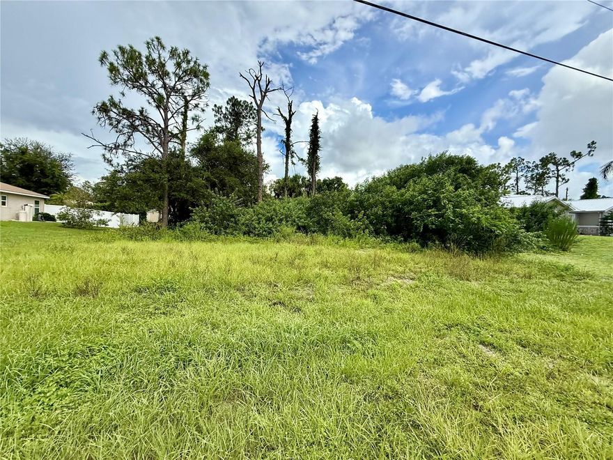 Looking for that perfect piece of land to build your slice of paradise on? Here's a great lot in this fabulous area of North Port! NO flood insurance required, save money and build with confidence!!! Electric at site, and no need to worry about mitigating Scrub Jays as property is NOT located in a habitat. Bring all your toys...store your RV, boat, kayaks, put up a detached garage, shed for an art studio, trampoline, or treehouse, doesn't matter as this is a non-deed restricted area of Sarasota County! And of course, what could be more Florida than having your own pool which the property has plenty of room for! Property is close to all amenities including sandy beaches & crystal waters of Venice, Englewood & Boca Grande Beaches, Golf Courses, boat launches, minutes from TWO Spring training Stadiums, the Rays & the Braves who hosts games against the Yankees, Red Sox, Mets & more. Have local builder with floorplans of 3 bedroom 2 bathroom homes with 10’ ceilings, 8’ doors porcelain plank flooring throughout, Quartz/Granite, lighting & fans, appliances, Impact windows…all-inclusive pricing starting at $320,000.