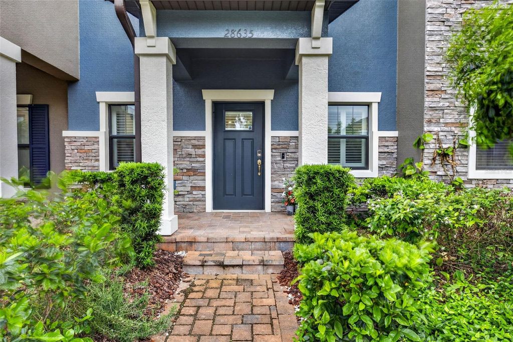 Photo of 28635 Tranquil Lake Circle, Wesley Chapel, FL 33543 (MLS # TB8496549)