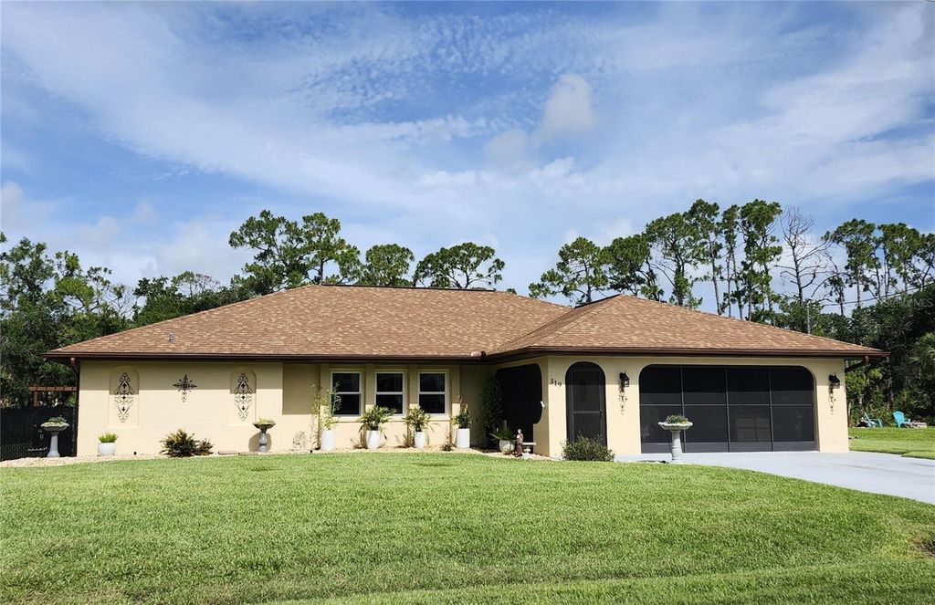Photo of 319 Kindred Boulevard, Port Charlotte, FL 33954 (MLS # C7521922)