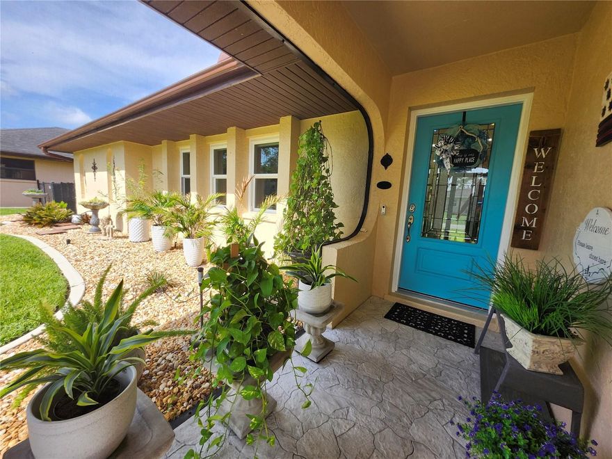 Pride of ownership, down to the very last detail. This beautifully renovated 3/2/2 Pool Home sits on a half-acre and backs up to the Auburn Waterway. As you pull up to the home you will notice the nicely manicured lawn, delicate touches put into the landscaping, Banana Trees and Palm Trees. Upon entering through the front screen door to the porch, you will notice the screened alcove, it enhances the entry way, as the white and grey stone pathway lead you to the colorful teal /glass front door. Upon entry just take a moment and feel the love that has been put into this home, pay close attention to every detail and thought that went into making this house a home. The high ceilings adorned with beautiful wood beams, and the ceramic flooring throughout just adds to the character of this home. The living room / kitchen combination offers the perfect space for entertaining. The Breakfast Bar boasts  5 x 11 feet and is 40 inches tall, Stainless Steel Appliances, Pass thru Window, Built in Pantry, Granite throughout, all Impact Windows (Sliders have Kevlar Fabric), Pocket Sliding Doors, all Bedrooms offer Walk-In Closets. Built in Library, tons of storage space throughout the home.  Fresh paint inside and out.  New Roof in 2020, Whole House RO System 2024, Sprinkler System, Duct Work 2024, Well Pump 2024, Septic Tank 2019, and the list goes on. The Owners Suite is large and has its own private access to the Lanai and Pool area, New Ceramic Tile, Walk- In Closets. Owners Bath offers Stone floors and Shower, Dual Sinks with Crystal Lighting. Both Guest Bedrooms are ample in size and offer Walk-In Closets. The third bedroom has wonderful views of the waterway and pool area. All rooms have beautifully hand crafted shelving. The Guest Bathroom is large and has private access to the Pool area. The Family Room offers extra space that can be used as an office, game room, library or just another cozy spot to relax. There is a small dining nook that overlooks the pool area, slider has a built in puppy door. Owners have added a lush, green fenced in area for your fur babies with anytime access. The attention to detail, decor and the vibe it brings...breathtaking. As you exit through the kitchen sliders you will step into the POOL ZONE. The Lanai is a boasting 33x14 with triple fan lights, Patio Sun Shades, Child Proof Security Fence and the floors have No Slip Granite Grip. The large sparkling Heated Pool (28x13) has just been resurfaced. This home sits on a fresh water canal (Auburn Waterway) with 160 feet of water frontage. Enjoy kayaking, fishing or just for your viewing pleasure. The large 14x9 dock provides plenty of space for entertaining, fishing or sunning. The wildlife is abundant, a great place for bird watching. The 21 x 20 garage is full of shelving and storage, has screened sliders doors and a side entrance door. There is an 8 x 10 shed on the extra lot. Plenty of room for a Motor Home or Large Garage. There is so much more to this home so schedule your showing today. This Home is ready for You to come and claim it for yourself. Close to shopping, Dining, Medical Facilities, Entertainment, and a short drive to some of the best BEACHES in Florida.