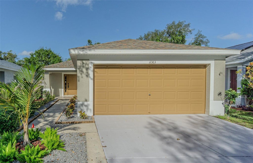 Photo of 11363 Cocoa Beach Drive, Riverview, FL 33569 (MLS # TB8549919)