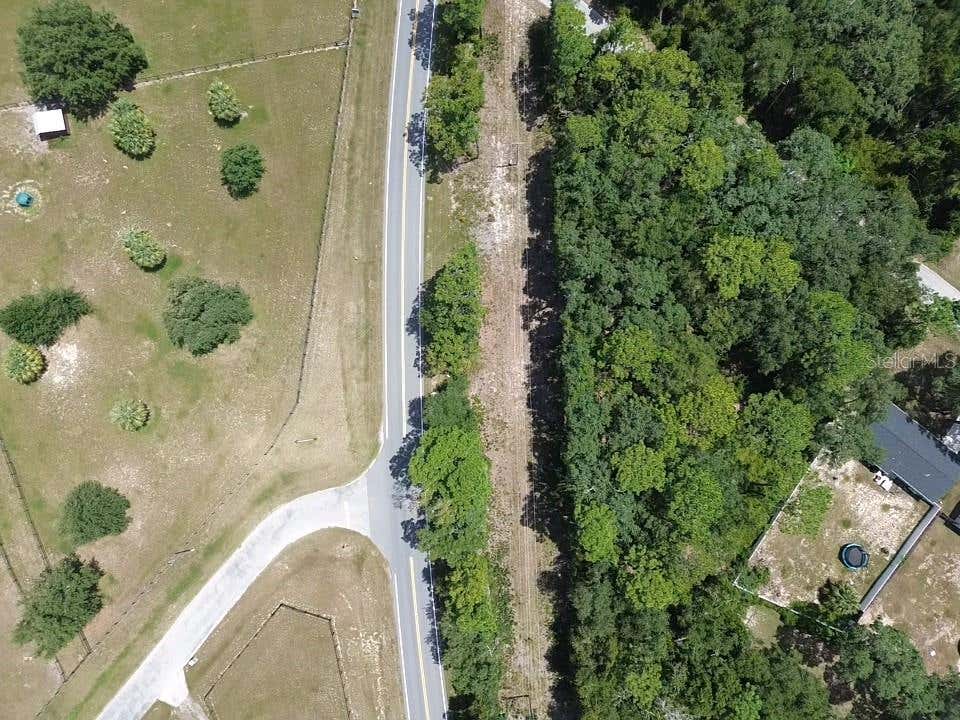 Photo of Tbd SE 180th Ave Road, Ocklawaha, FL 32179 (MLS # OM730474)