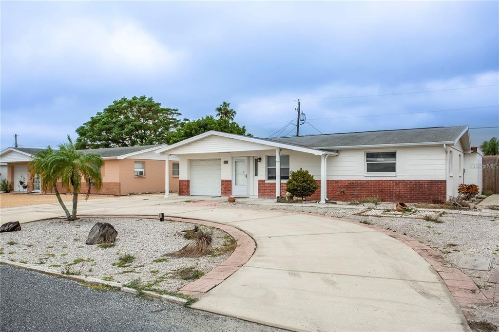 Photo of 4031 Chesswood Drive, Holiday, FL 34691 (MLS # TB8371399)
