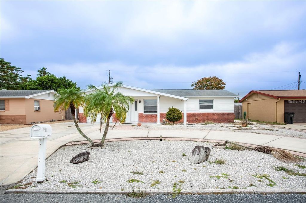 Photo of 4031 Chesswood Drive, Holiday, FL 34691 (MLS # TB8371399)