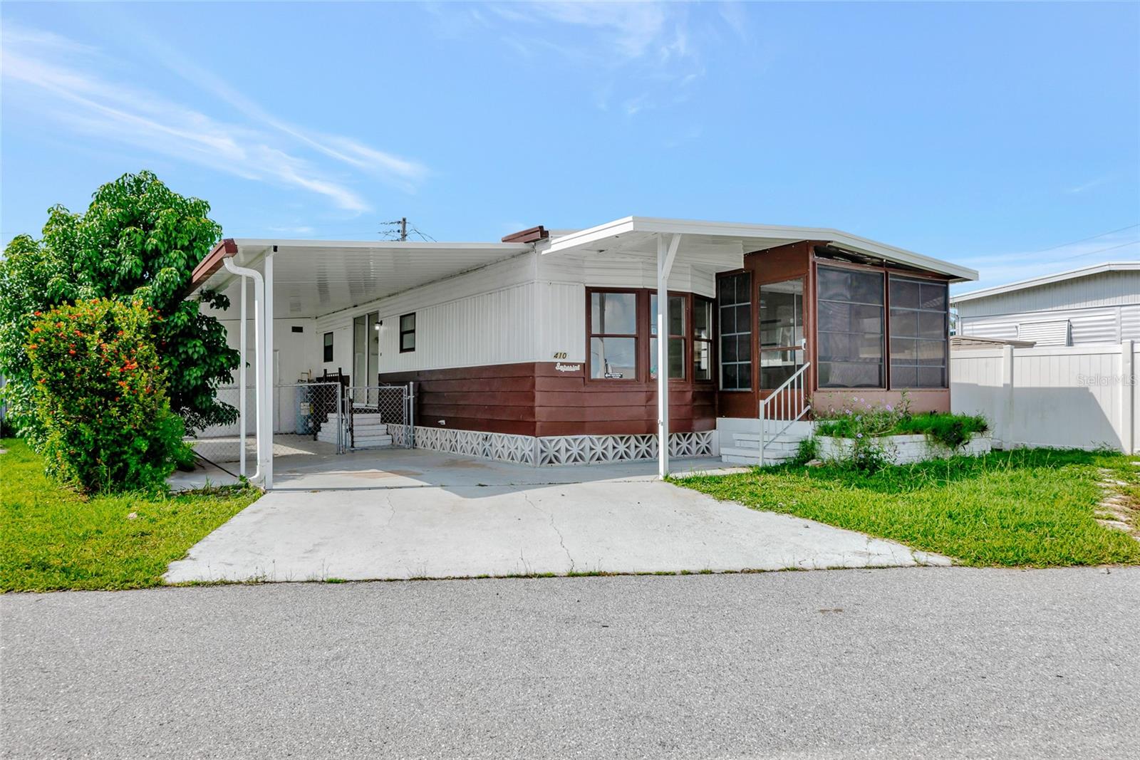 Looking for a home in a LAND-OWNED community? Well, guess what—you just found The One! This freshly painted charmer is move-in ready and waiting to impress. Step inside and be greeted by luxury vinyl floors so stylish, even your socks will want to slide around in celebration.
This home also features a beautiful kitchen and dining room—perfect for everything from quiet morning coffee to hosting dinner parties that end with compliments and second helpings. Whether you're a microwave master or a five-star chef, this space brings the flavor.
The massive primary suite is basically a mini-retreat—complete with a tastefully updated ensuite bathroom and a walk-in closet big enough to get lost in (but not too lost). Hosting friends or family? No problem! The guest bedroom comes with its own updated full bath, so visitors might never want to leave (you’ve been warned).
And here’s the icing on the cake: NEW roof, NEW AC, NEW carport, Bathrooms updated in 2022 AND the low HOA fee also covers your sewer, trash, and water—because who really wants to think about utility bills, anyway?
Whether you're downsizing, rightsizing, or just ready to stop renting, this beauty has you covered. Come see it before someone else makes it their happily ever after!