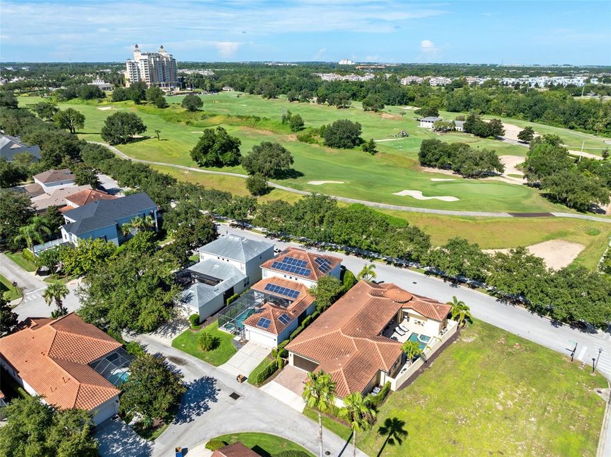 In the heart of Reunion Resort’s sought-after Homestead neighborhood, this rare single-story luxury custom home offers a balance of privacy, elegance and resort-style living. Framed by front-facing views of the Tom Watson golf course and designed around a sun-drenched walled courtyard with a sparkling pool and spa, the home invites a sense of calm and retreat the moment you enter. Arched patio doors open from the main living area and the expansive primary suite, creating a seamless connection to the tranquil outdoor space. Inside, the style blends timeless Spanish architecture with warm, transitional interiors, enhanced by a variety of surprising architectural details that add charm and character throughout. Beamed ceilings, a cozy fireplace and elegant Ethan Allen furnishings anchor the open-concept living and dining space, while twin archways lead to a beautifully appointed farmhouse kitchen featuring a Thermador range and built-in high quality appliances, walk-in pantry, and a custom eat-in design with built-in seating for four—a seamless extension of the expansive kitchen counter that makes gathering effortless and inviting. The private primary suite is a sanctuary, complete with its own fireplace, 70-inch television, refreshment bar, spa-like bath with a gleaming freestanding tub, and a custom walk-in closet, plus a bonus room ideal for a gym, office, or additional dressing room. Three additional bedrooms include a separate casita with private entry, ideal for guests or extended family. Offered fully furnished and ready for immediate enjoyment, the home also has an active Reunion Club membership granting optional access to the resort’s world-class amenities—three signature golf courses, a five-acre water park, tennis and pickleball, fitness centers, restaurants and more—and even comes with a golf cart for exploring the community in true resort style. Just six miles from Walt Disney World and under 30 miles to Orlando International Airport, this home offers not just a place to live, but a lifestyle to fall in love with. Qualified buyers may receive a one-year interest rate buydown for the first year paid for by the seller's preferred lender when financing this home (subject to credit approval and program availability) so call today for details.