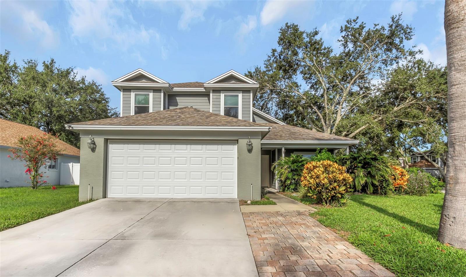 One or more photo(s) has been virtually staged. It’s all about location! Nestled on a desirable corner lot, this home offers space and convenience, with everything you need just minutes away.
Zoned for top-rated schools; Palm Harbor University, Carwise Middle, and Highland Lakes Elementary. Not to mention, positioned on higher ground in Flood Zone X for extra peace of mind.
Step inside to the soaring 20 foot vaulted ceilings and oversized windows that bring in natural light to the main level, enhancing the open concept living space.
The kitchen is complete with shaker cabinets, granite counters, stainless steel appliances, and modern flooring.
The primary bedroom offers double door entry, a walk-in closet, and an en-suite bathroom with a soaking tub.
Upstairs, you’ll find three generously sized bedrooms and a full bath with plenty of counter space.
Outside, enjoy a newly vinyl fenced backyard with a spacious concrete patio, covered lounge area with fan and TV hookup, ideal for entertaining.
Major updates include new windows (2022), new garage door (2025), vinyl fence (2025), and new baseboards.
Only one sale in the subdivision in the last year. Don’t miss this rare opportunity, schedule your private showing today!
**Use the seller’s preferred lender and receive a no cost 1-0 temporary rate buydown, for the first year of your mortgage.
