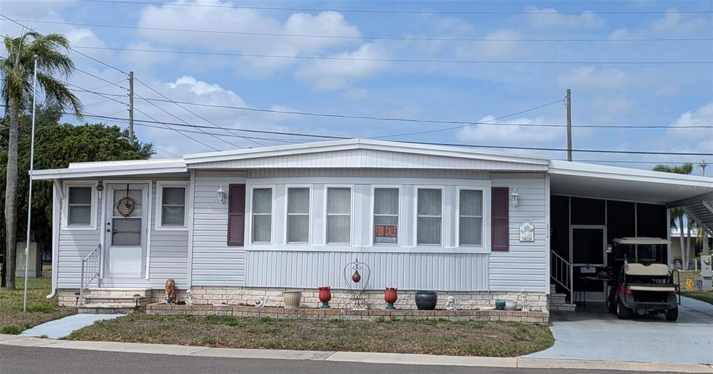 Photo of 34214 Canal Drive N, Pinellas Park, FL 33781 (MLS # TB8502574)