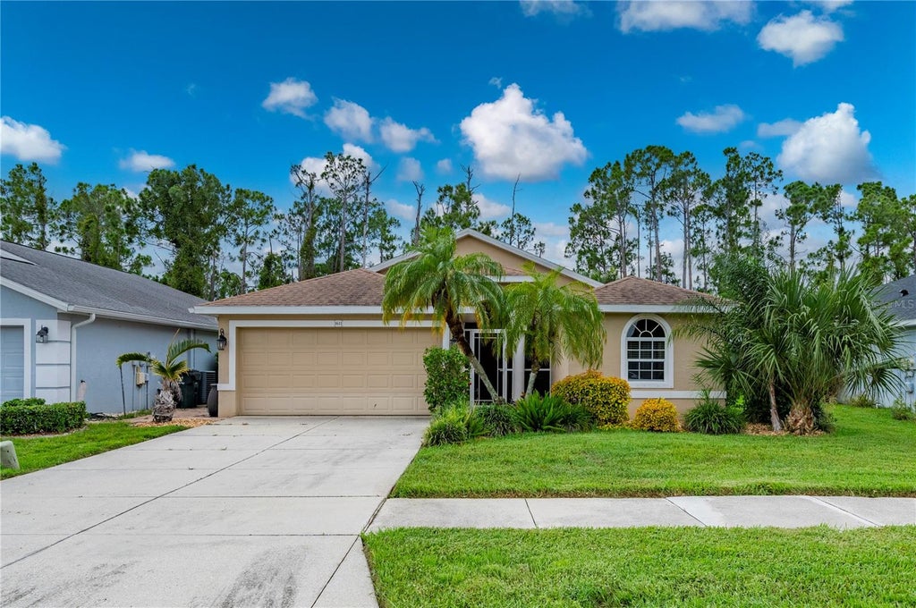 Photo of 1611 Scarlett Avenue, North Port, FL 34289 (MLS # C7528950)