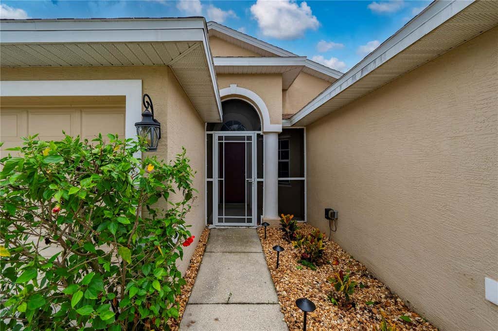 Photo of 1611 Scarlett Avenue, North Port, FL 34289 (MLS # C7528950)