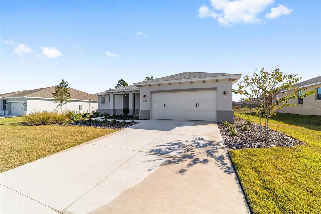 Photo of 10002 SW 106th Circle, Ocala, FL 34481 (MLS # OM714255)